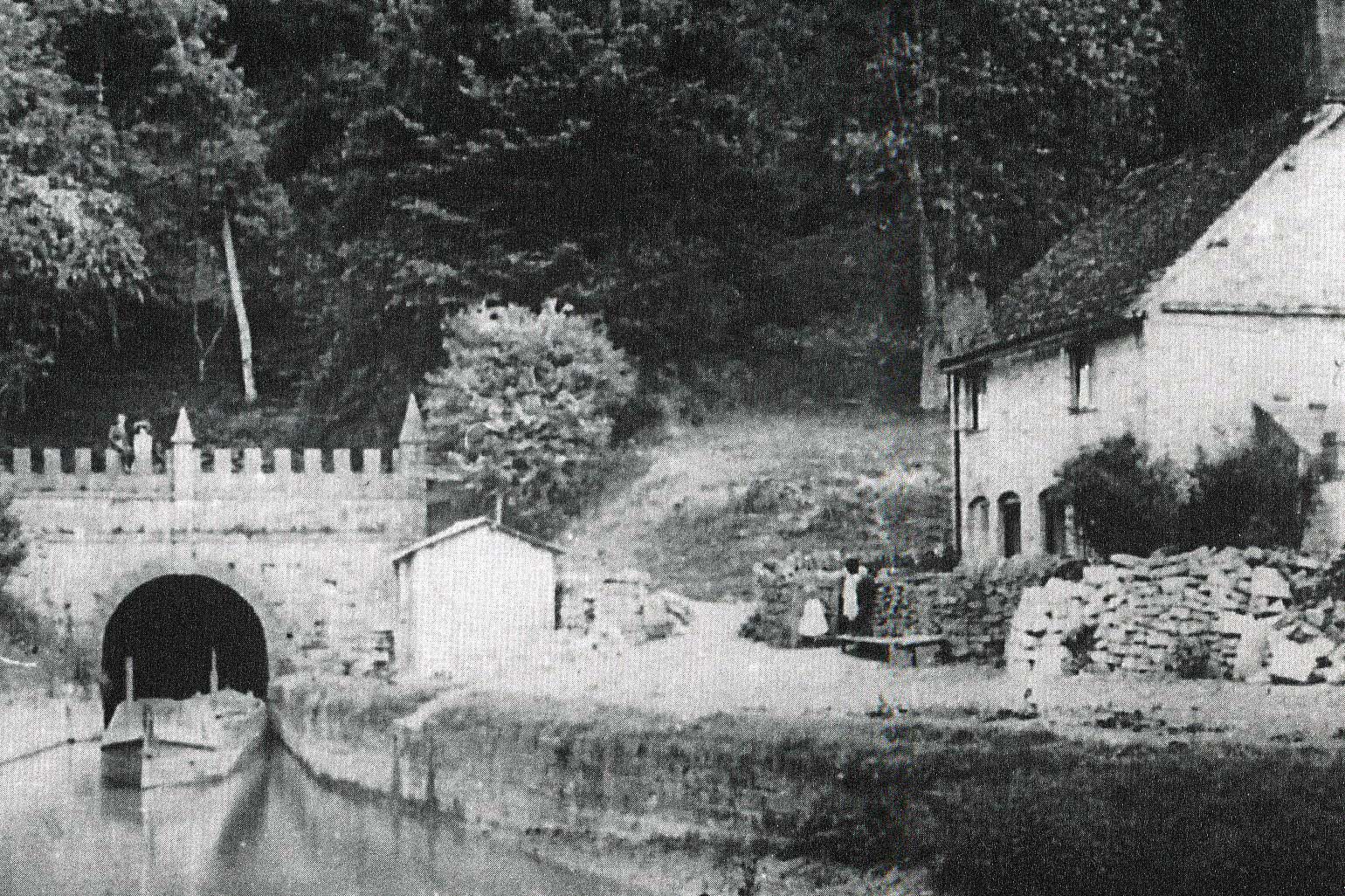 Daneway end of Sapperton Canal Tunnel c.1910. Note the low water level